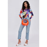 Orange circular acrylic handbag with a gold chain strap model 4
