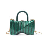 Green marbled handbag with gold gold shoulder chain strap and green handles