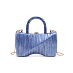 Blue marbled handbag with gold gold shoulder chain strap and blue handles back
