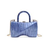 Blue marbled handbag with gold gold shoulder chain strap and blue handles back