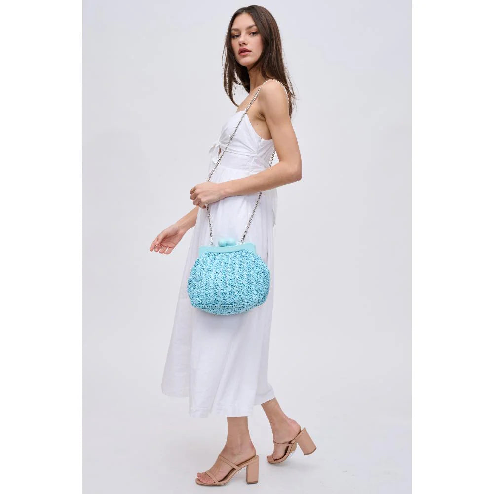 Light blue textured handbag with a chain strap model 3