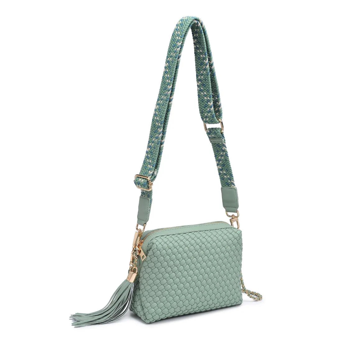 Green textured handbag with a green black and white striped strap alt view