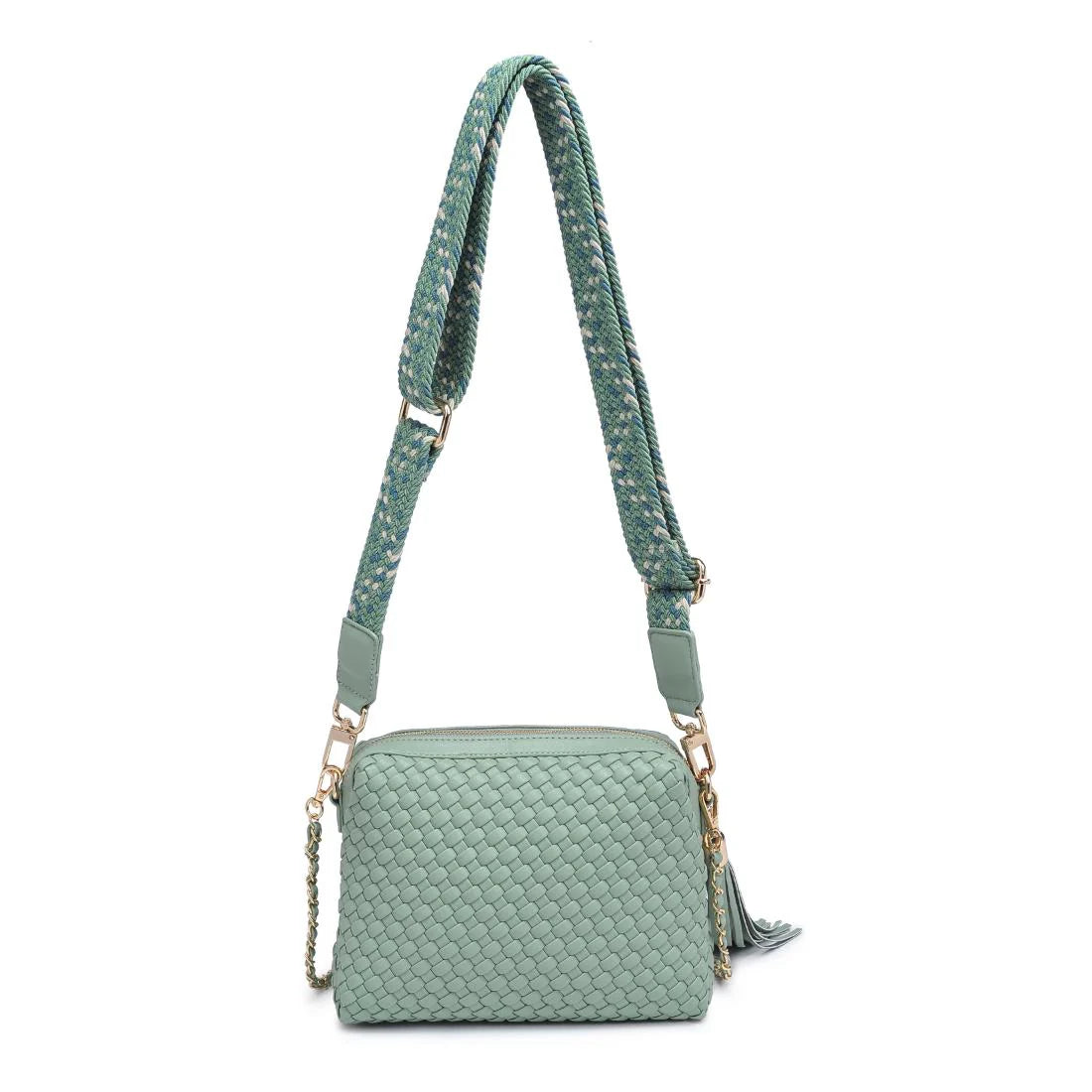 Green textured handbag with a green black and white striped strap back
