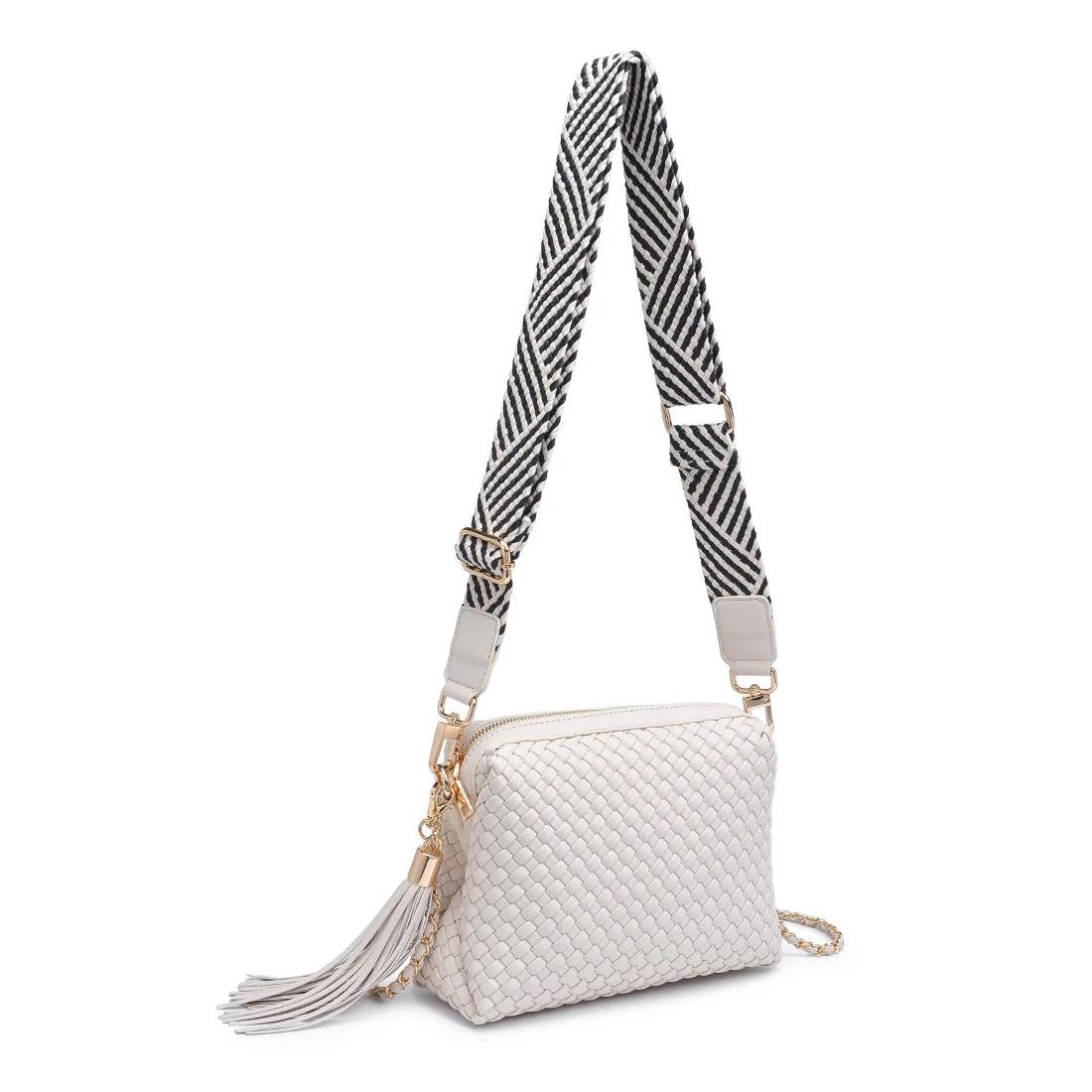 White textured handbag with a black and white striped strap alt view