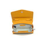 Yellow handbag with cut-out design opening