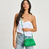 Green pleated handbag with a strap model