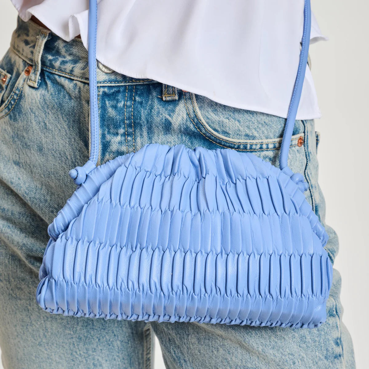 Blue pleated handbag with a strap model 4