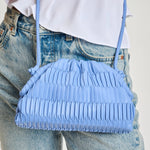 Blue pleated handbag with a strap model 4