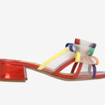 Multicolored heel with bow and red heel close-up