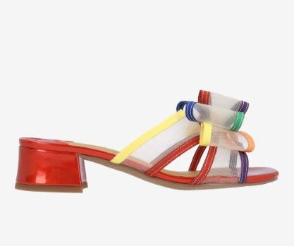 Multicolored heel with bow and red heel close-up