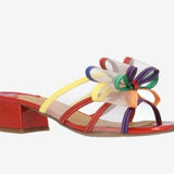 Multicolored heel with bow and red heel side view