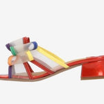 Multicolored heel with bow and red heel inside view