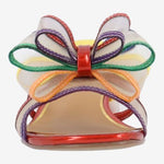 Multicolored heel with bow and red heel toe box