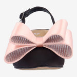Black high-heeled shoe with pink bow toe box