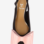 Black high-heeled shoe with pink bow top view