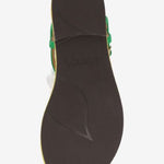 Green sandal with a white flower and yellow heel sole