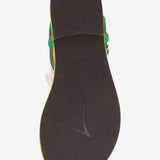 Green sandal with a white flower and yellow heel sole