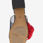 Black heel with a red flower and white/transparent strap sole
