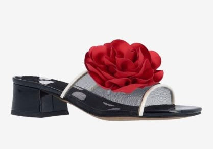 Black heel with a red flower and white/transparent strap side view