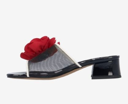 Black heel with a red flower and white/transparent strap inside view