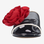 Black heel with a red flower and white/transparent strap toe box