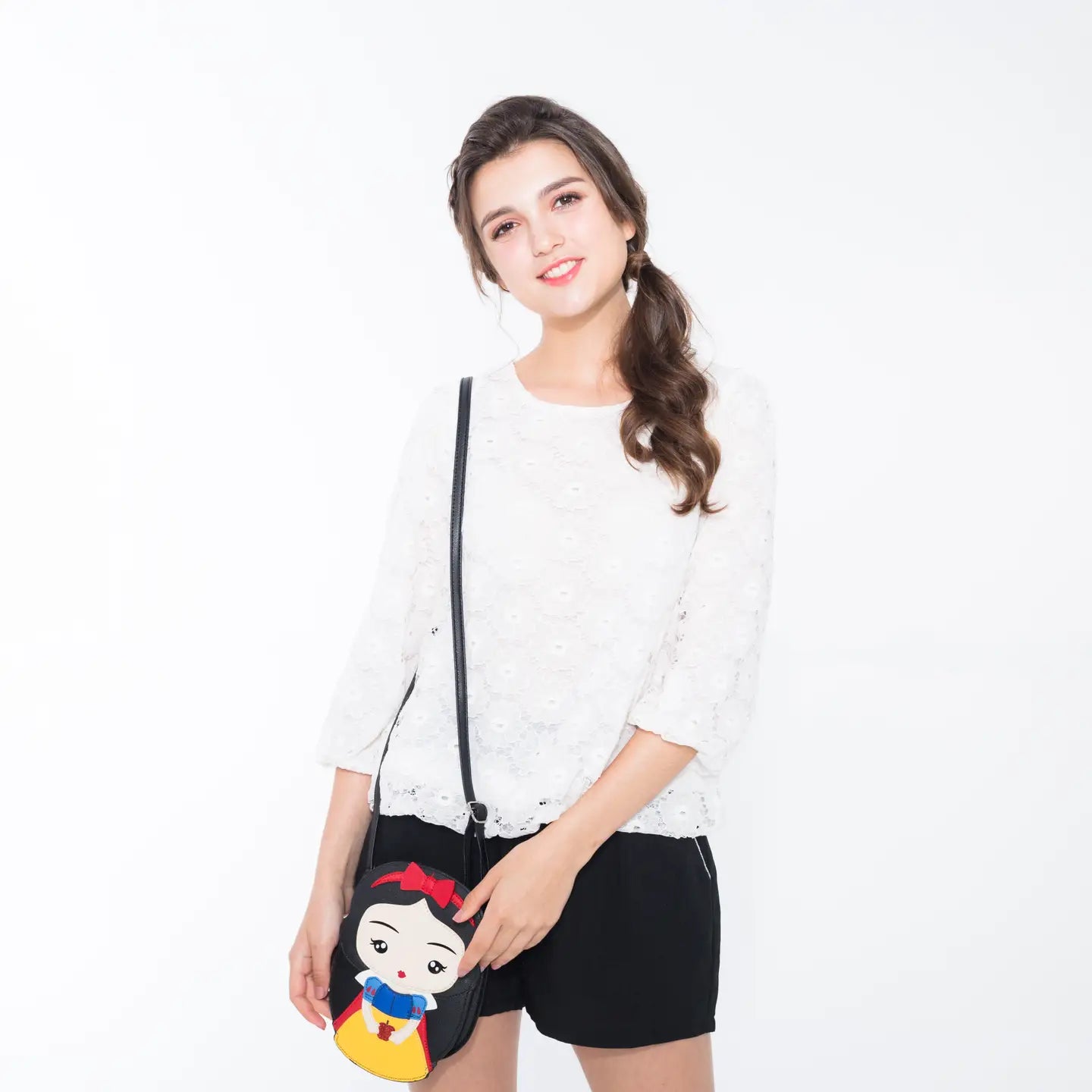 Snow White character holding apple purse model 2