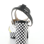 High-heeled platform shoe with checkered heel and yellow/white toe strap heel view