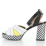 High-heeled platform shoe with checkered heel and yellow/white toe strap inside alternate view