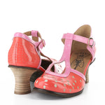 Red polka dot shoe with pink strap and buckle closure pair
