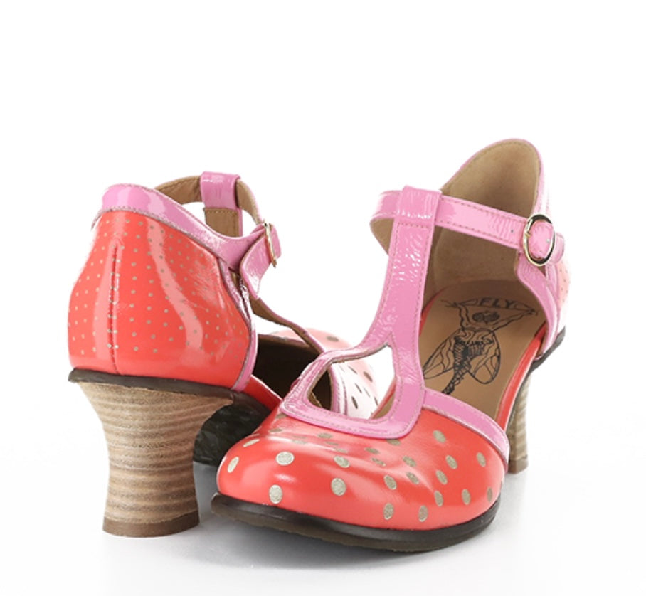 Red polka dot shoe with pink strap and buckle closure pair