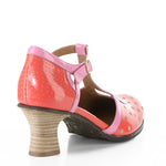 Red polka dot shoe with pink strap and buckle closure heel alternate view