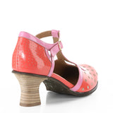 Red polka dot shoe with pink strap and buckle closure heel alternate view