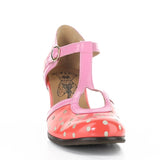Red polka dot shoe with pink strap and buckle closure toe box