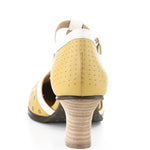 Yellow polka-dot shoe with white straps and buckle closure alternate heel view