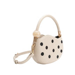 Off-white handbag with black polka dots and pearl handle alt view