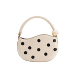 Off-white handbag with black polka dots and pearl handle back