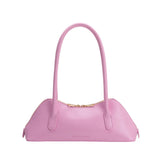 Pink handbag with a gold zipper and pink hand strap back
