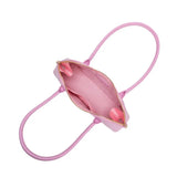 Pink handbag with a gold zipper and pink hand strap opening