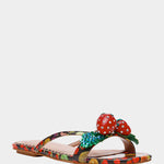 Colorful sandal with a decorative strawberry on toe strap front view