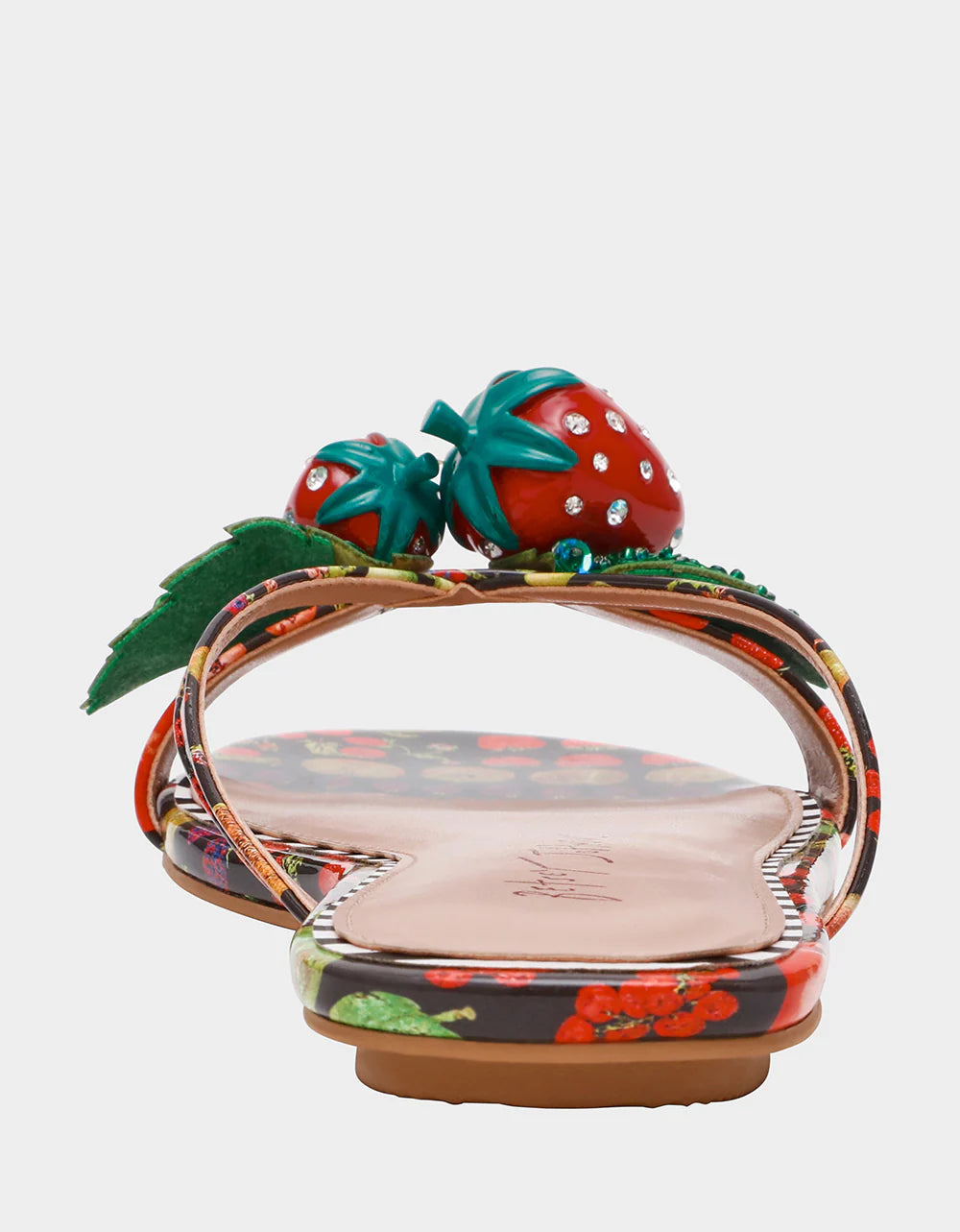 Colorful sandal with a decorative strawberry on toe strap heel view