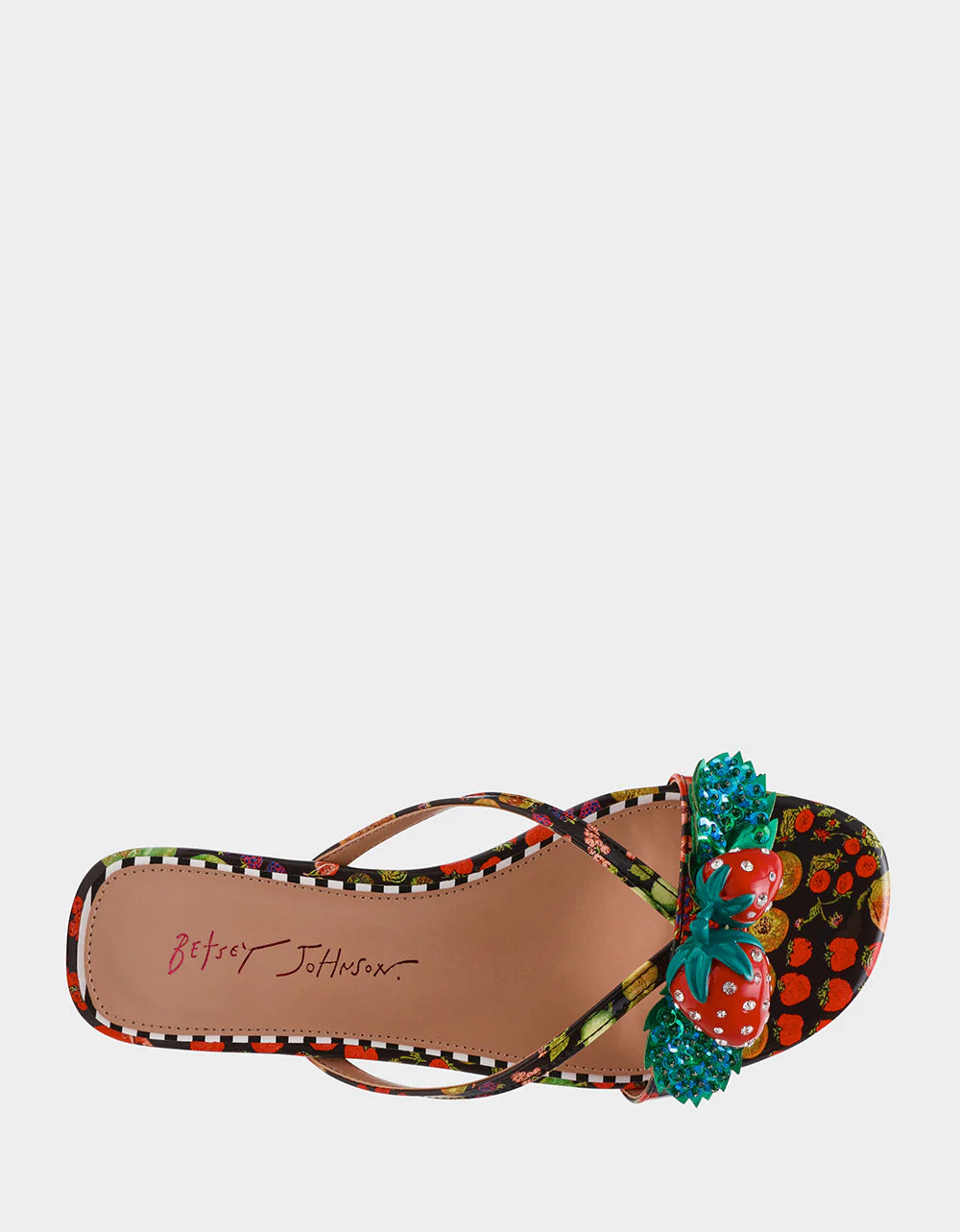 Colorful sandal with a decorative strawberry on toe strap top view