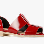 Red sandal with beige sole close-up