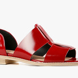 Red sandal with beige sole close-up