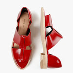 Red sandal with beige sole top and side view