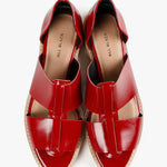 Red sandal with beige sole top view