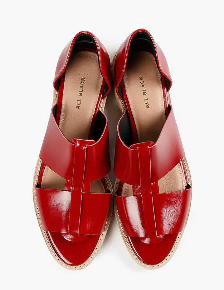Red sandal with beige sole top view