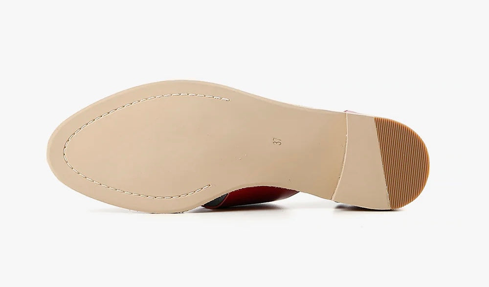 Red sandal with beige sole sole view