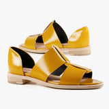 Yellow sandal with beige sole pair