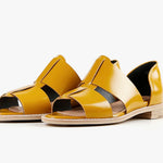 Yellow sandal with beige sole pair front view