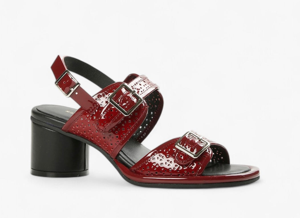 Red heel with decorative straps block block heel and buckle closure close-up